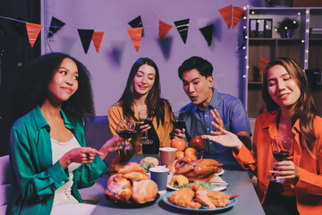 Joyful office Halloween party with coworkers in costumes, celebrating with drinks and laughter, fostering teamwork and festive spirit