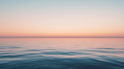 Obraz premium Clear sky with subtle shades of pink and orange as the day turns to night