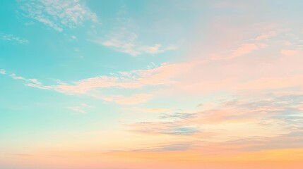 Fototapeta premium Clear sky at sunrise with soft pastel hues blending from blue to peach