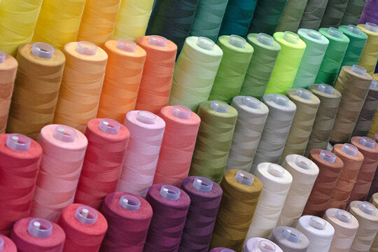 Spools of multi-coloured cotton threads