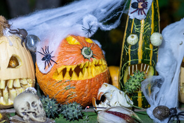 Unusual original Halloween composition, scary Jack O Lantern Halloween pumpkins in the dark