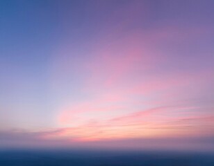 Fototapeta premium Soft pink and lavender sky with a gentle glow