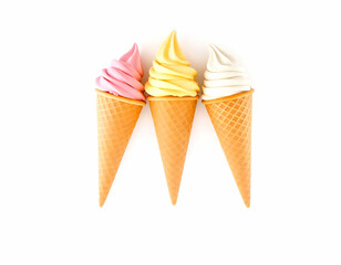 Assorted ice cream cones with pink, yellow, and white soft, A row of various ice cream scoops in waffle cones, including pink, yellow, and brown flavors , white background 
