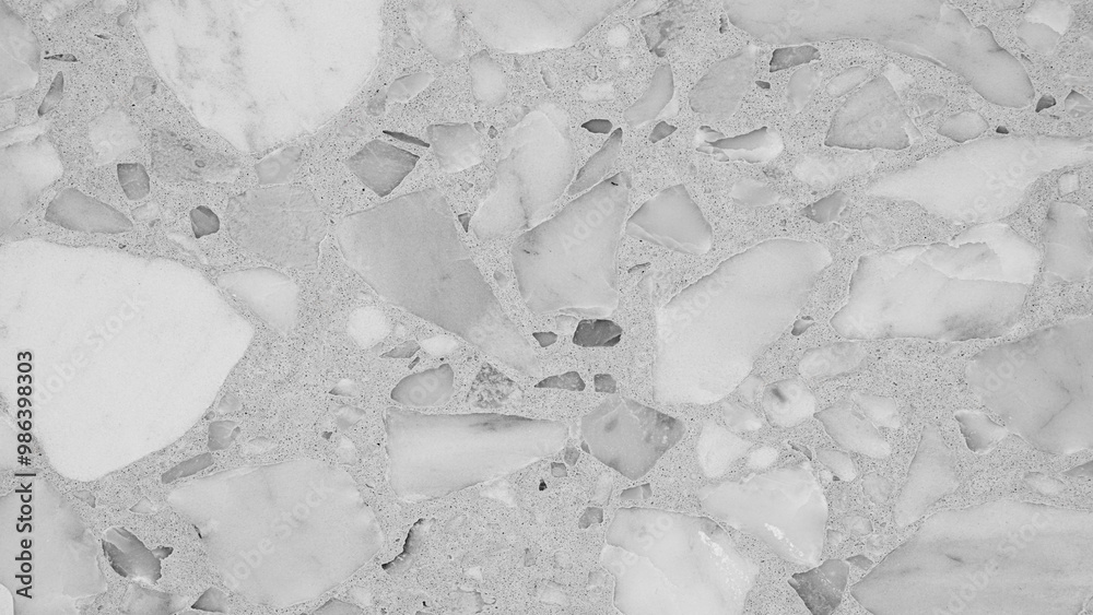 Aufkleber a white and gray stone surface with many small pieces of stone. the stone is rough and jagged, givin