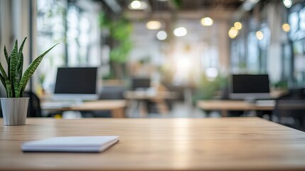 Modern business office with blurred background A 3D rendering of an empty workspace featuring tables chairs and computers perfect for presentations or design mockups