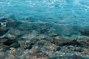 Crystal Clear Waters Reveal Stunning Rocky Formations Beneath  Serene Ocean Surface