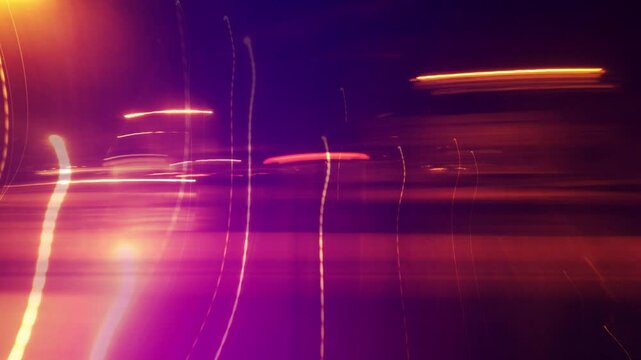 City traffic at night, long exposure image of lights and colors in motion as abstract background, 4K hyperlapse