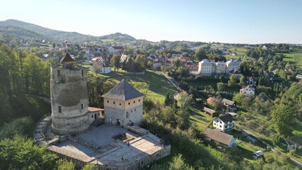 Fototapeta premium The picturesque and ancient castle is built on a hill with a magnificent view of the city of Czchów, Poland