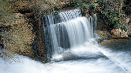 Water falls with long exposure in the Cerrada del Río Castril in the town of the same name, in Granada, Andalusia, Spain