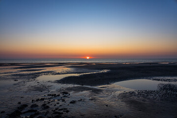 Fototapeta premium Coucher de soleil sur l'océan à Cayeux-sur-Mer