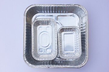 Aluminum foil containers, particularly those described as square and rectangular, are designed for...