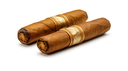 Two whole cigars laying one on top of the other on an isolated white background