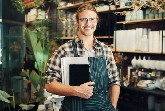 Portrait, flower store and man with documents, tablet and smile with small business. Face, person and entrepreneur in ship, friendly service and paperwork with tech, confidence and pride with startup - Powered by Adobe