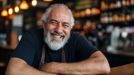 Fototapeta premium A middle-aged bartender with a thick beard and bright smile engages with customers at a lively pub filled with warm light and a welcoming atmosphere during the evening hours