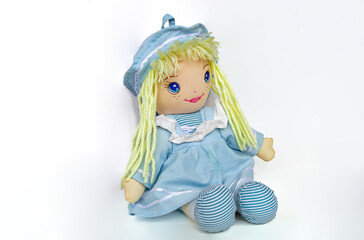 Handmade doll girl, made of fabric, painted with acrylic paints. High quality photo