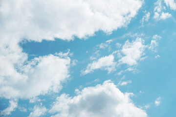 Shape of a clodu on the sky. Soft heaven texture of the sky. Dreamy clouds. Heavenly atmosphere. Blue sky background. Bright clodus pattern.