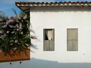Folkloric facade of the old town of Barichara in Santander, Colombia. Many of the houses used to be made from clay and later panted with calcium