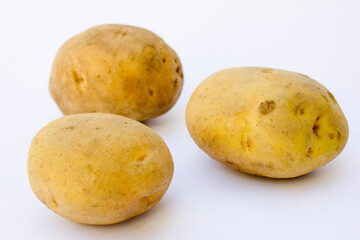 A potato (Solanum tuberosum) is rich in carbohydrates, fiber, and vitamins C and B6. Provides about 25% of the vitamin C in the average European diet