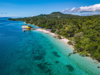 Obraz premium Aerial View of Hunimua Beach in Liang Village, Maluku, Indonesia