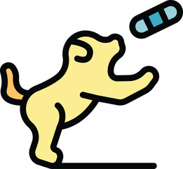 Playful puppy jumping to catch a bone toy