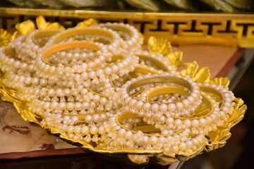 Close up of a necklace on the table, Necklaces For Hands, White Beautiful Necklace, Beautiful white Necklace, Amazing, Stunning