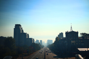 Fototapeta premium Smog in the city at dawn. Kyiv 2024.