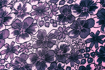 lilac floral pattern on fabric. wallpaper in a rustic modern design.  lilac textile texture.