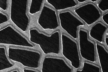 texture of gray knitted fabric with linear abstract ornament, pattern