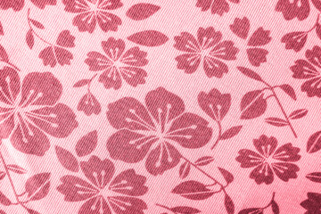Obraz premium pink floral pattern on fabric. wallpaper in a rustic modern design. pink textile texture.