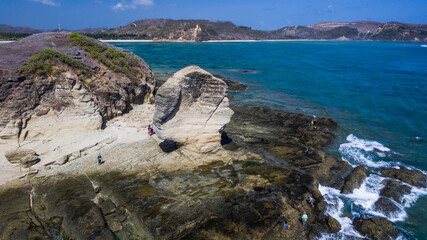 Batu Payung ( Umbrella Stone) at Lombok Kuta Beach was formed through geology process.