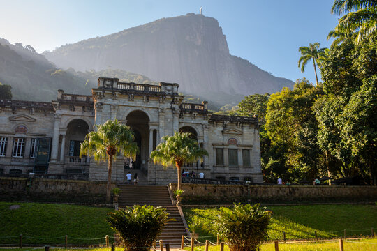 Rio de Janeiro, Brazil, May 4th 2024. The Palace of Park Lage and Christ the Redeemer behind it at sunset.