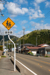 Japanese countryside in Aoba Ward, Miyagi prefecture, Sendai. The sign says 'School route'.