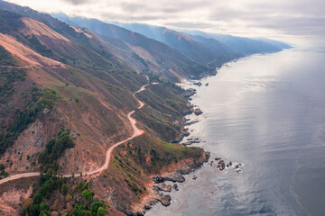 Highway 1 and Big Sur along the Pacific Ocean coast, beautiful landscape and aerial view, sunset, sunrise, fog. Concept, travel, vacation, weekend