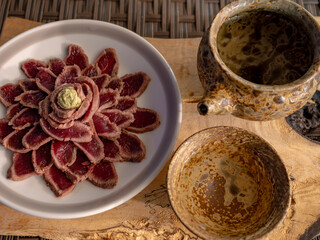 鹿のお肉で日本酒を飲む