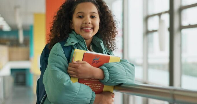 Child, face and girl with school hallway, books and educational institution with kid for growth. Knowledge development, student and happy for class, elementary and future or learner for scholarship