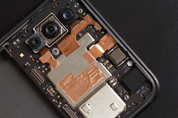 Disassembled phone, without battery and back cover, phone repair