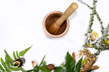 Spices and  organic natural essential oil on white background. Concept of herbal, Alternative medicine therapy, Ayurveda, homeopathy concept, aromatherapy bottle with mortar, isolated white background