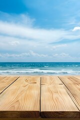 Fototapeta premium Empty wooden table top on a blurred background of ocean waves under a blue sky with clouds