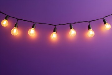 String of glowing retro light bulbs hanging on a purple wall background for party and celebration design