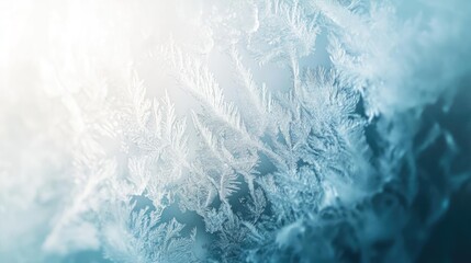 Fototapeta premium A close-up of intricate frost patterns on a surface, showcasing the delicate beauty of winter and cold temperatures.