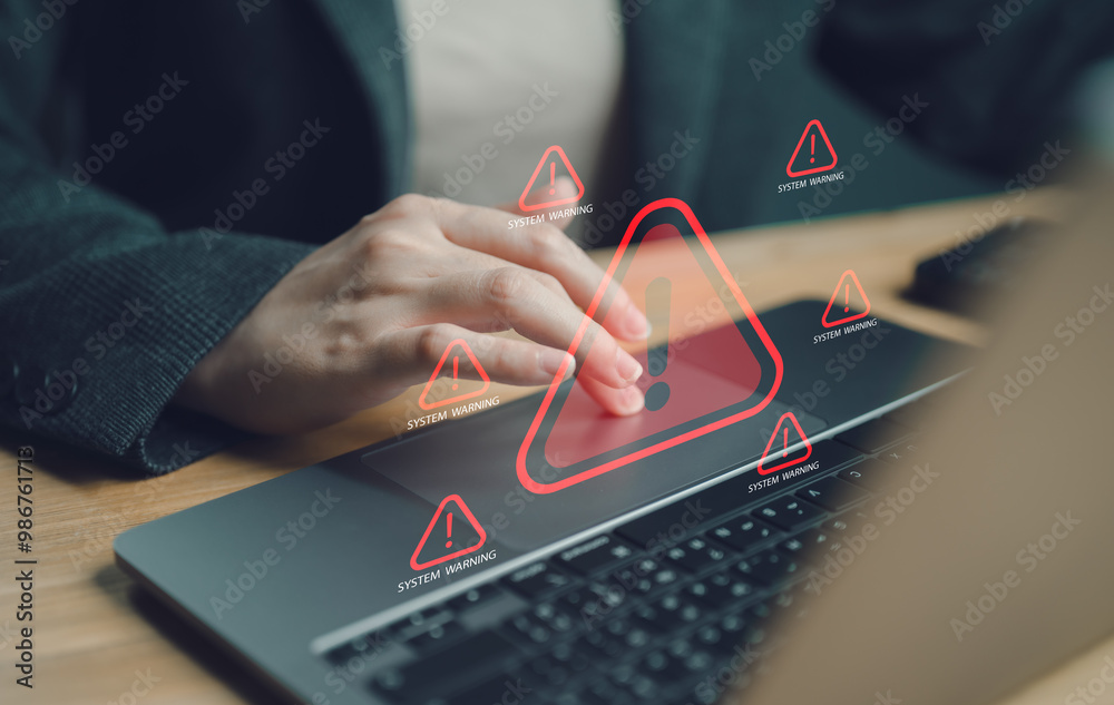 Wall mural system hacked warning alert on laptop computer. cyberattack on computer network, virus, spyware, mal