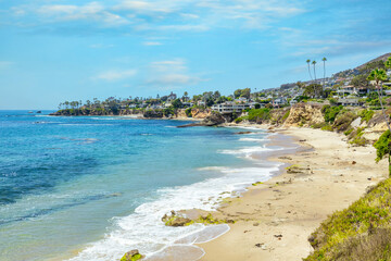 Beautiful landscape of Laguna Beach ocean coastline with palm trees in Treasure Island Park, Orange County, California, USA