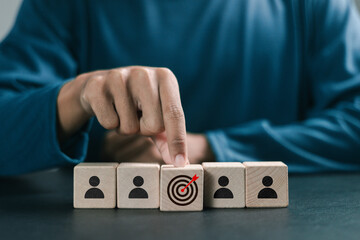CRM, customer relationship management concept. businessman with target icon and human icons on...