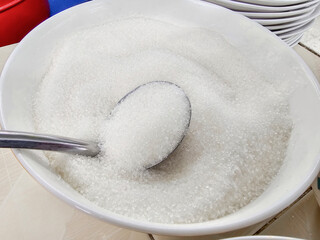 sugar in white bowl with spoon, Food seasonings in Thailand
