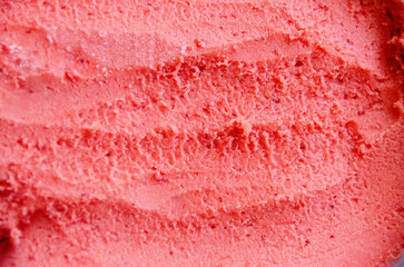 Raspberry sorbet texture, top view. Strawberry ice-cream pattern or texture. Texture surface of ice cream. Background of strawberry ice cream close-up. Banner. High quality photo