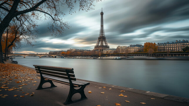 A bench is sitting on a sidewalk next to a river