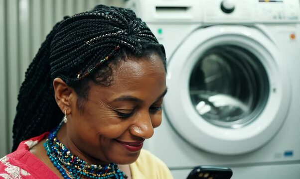 Tanzanian Woman Waiting at Laundromat with a Smile