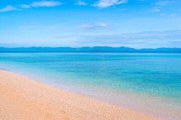Walking along the white sand of Talipasak Beach. Romblon Island, Philippines
