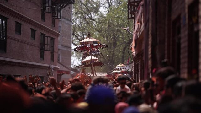 Holy Umbrella Spinning in the colorful Sindoor Jatra Festival of Nepal