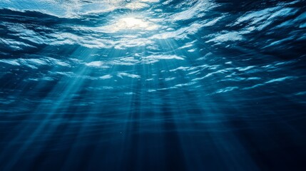 Deep blue sea with sunlight beams penetrating,